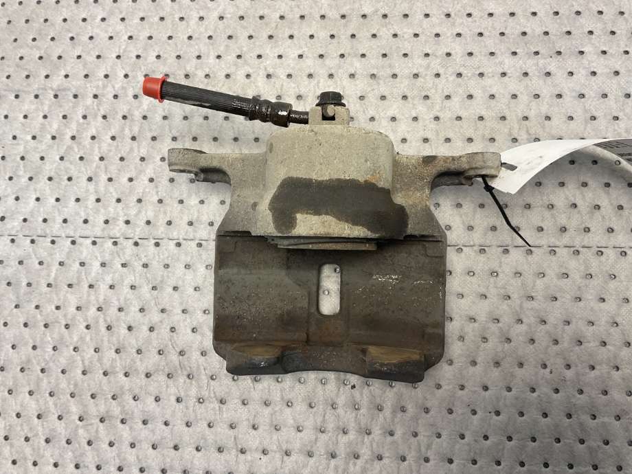 Bremsecaliper venstre foran til Nissan Qashqai 2007-2010 (Type I, Fase 1) (NISSAN|41011JD00A|)