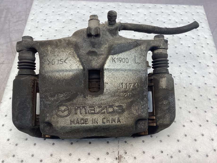Bremsecaliper venstre foran til Mazda 3 2013-2016 (Type III, Fase 1)  (MAZDA|)